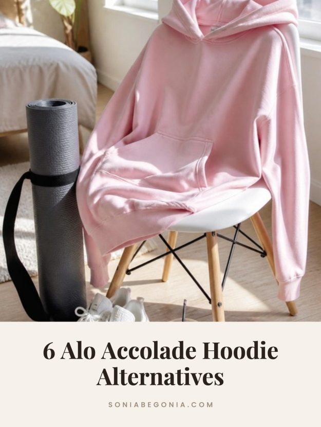 Alo Accolade hoodie alternatives: a pink oversized hoodie draped over a white chair next to a yoga mat