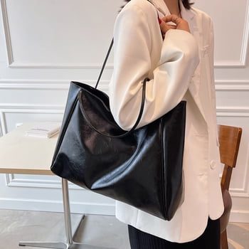 Black vintage genuine leather tote bag from Walmart, a The Row Park tote look alike