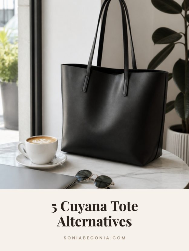 Cuyana tote alternatives: a black leather tote on a marble cafe table with a latte and laptop