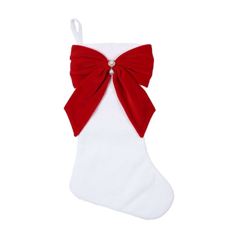 Holiday Time white Christmas stocking with a red velvet bow from Walmart