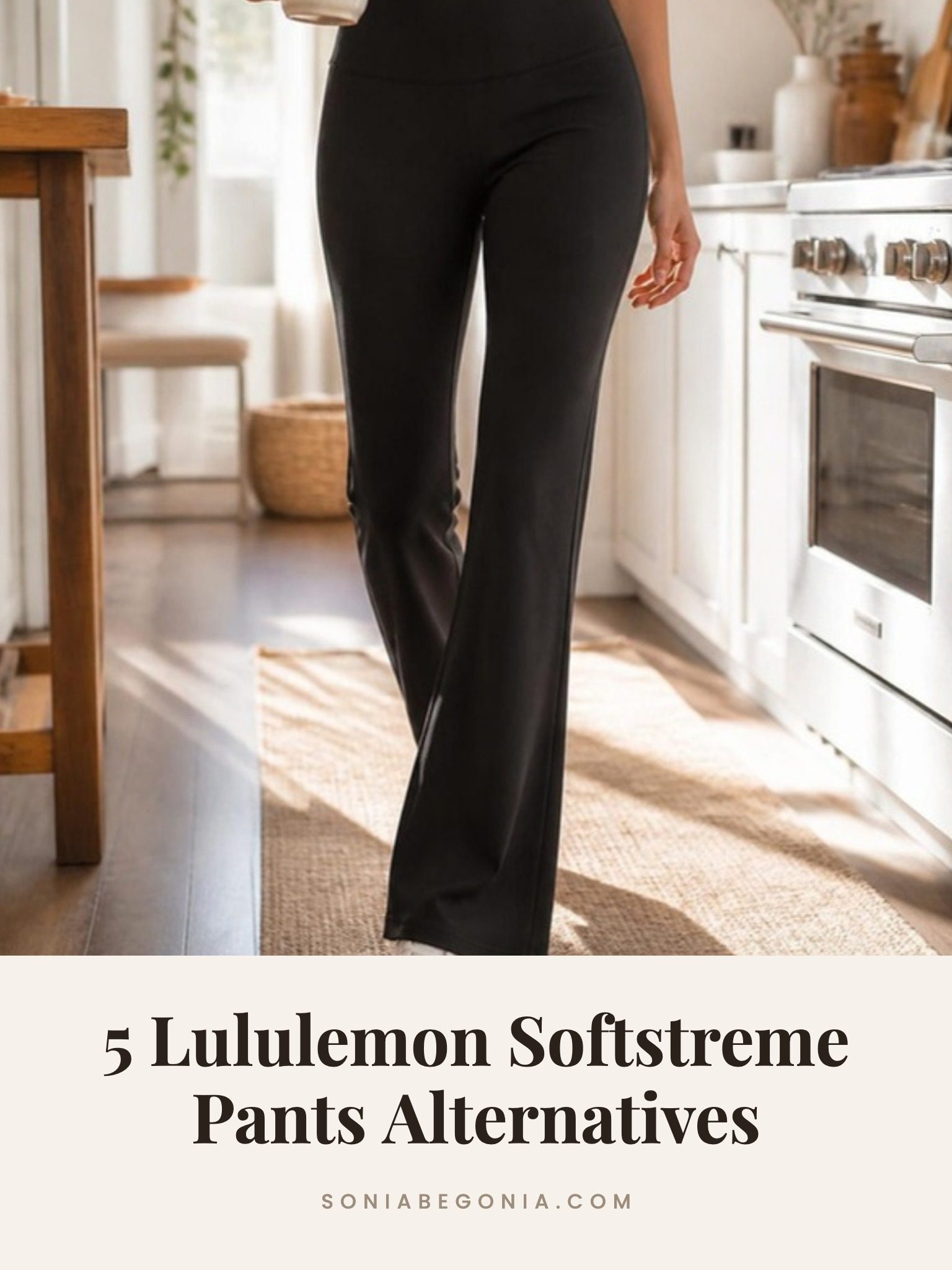 Lululemon Softstreme pants alternatives: black high rise flared pants with white sneakers in a sunny kitchen