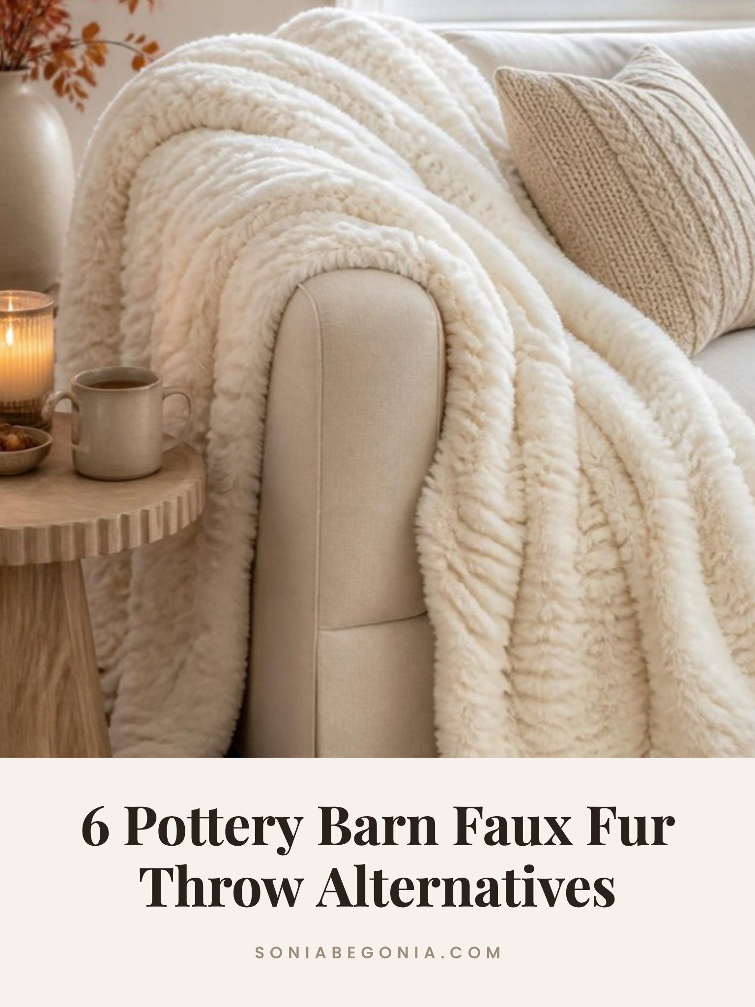 Pottery Barn faux fur throw alternatives: ivory ruched faux fur throw draped over a cream sofa
