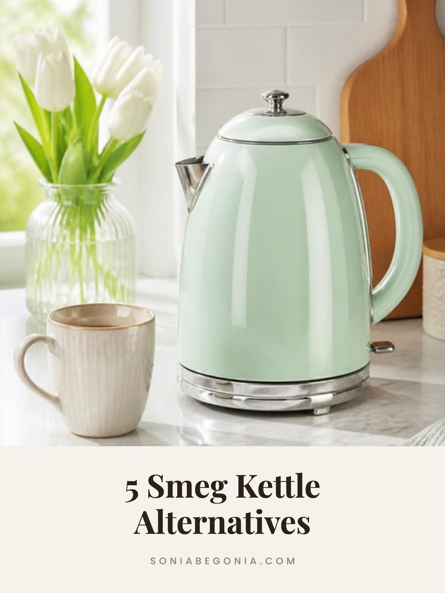 Smeg kettle alternatives: a mint green retro electric kettle on a marble counter